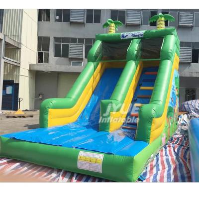 China 0.55mm PVC Castle Bounce House With Slide Jungle Animal Theme Inflatable Slide for sale