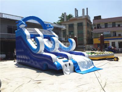 China La pequeña diapositiva inflable azul del delfín con el material del PVC/explota la pared que sube en venta
