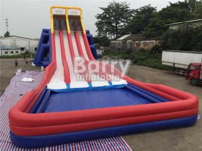 China Four Lanes Giant Inflatable Slide / PVC Water Slide With Big Pool For Adults for sale