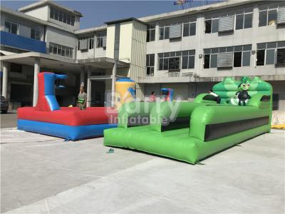 China Jogos infláveis dos esportes do corpo exterior que correm a competição super do jogo da corrida do tirante com mola à venda