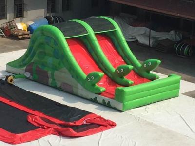 China Waterproof 0.55mm PVC Inflatable Adventure Slide Playground Equipment for sale
