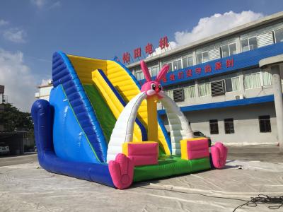 China Tarpaulin Inflatable Bouncer Rabbit Jumping Castle Bounce House With Slide for sale