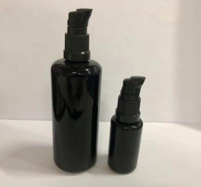 China Black Glass Lotion Bottles Dispenser Bottle Cosmetic Lotion Bottle Glass Makeup Containers for sale