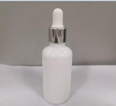 China 50ml White Glass Dropper Bottle Cosmetic Essential Oil Container Customized Logo And Color for sale