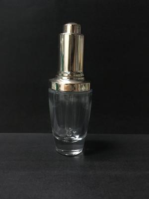 China as garrafas de óleo essencial Dopper do vidro 30ml engarrafam Skincare cilíndrico que empacota o OEM à venda