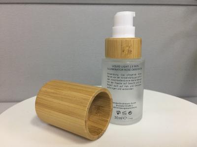 China SGS MSDS Bamboo Cosmetic Packaging Cylinder Glass Lotion Pump Bottle for sale