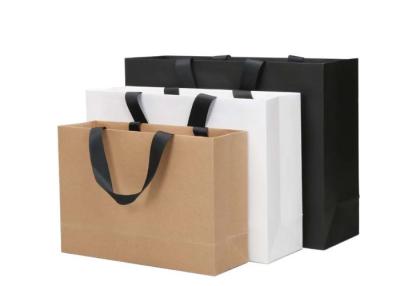 Chine La longévité élevée a imprimé la conception adaptée aux besoins du client de forme de résistance de larme de sacs en papier de Papier d'emballage à vendre