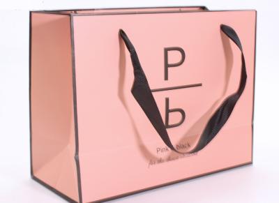 China Accurate Printing Pink Paper Carrier Bags , Fancy Boutique Shopping Bags for sale