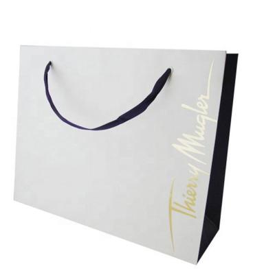 China Business Printed Kraft Paper Bags With Gold Hot Stamping Surface Finish for sale