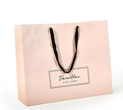 China Flat Cotton Handle Custom Design Paper Bags , Printed Paper Shopping Bags Pink Color for sale