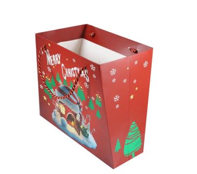 Chine La taille adaptée aux besoins du client a personnalisé le matériel imprimé de papier enduit de sacs de cadeau pour Noël à vendre