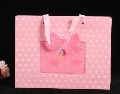 China Delicate Custom Printed Paper Bags / Pink Paper Carrier Bags For Toys / Jewelry for sale