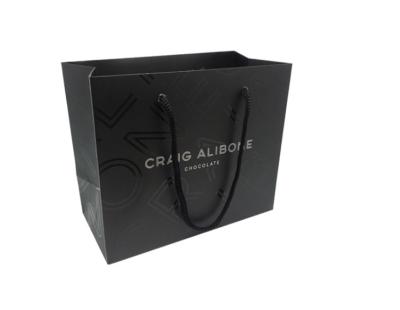 China High End Custom Printed Paper Bags / Black Paper Gift Bags Embossed Surface Disposal for sale