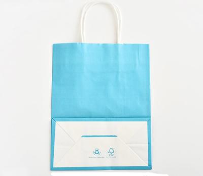 Китай Голубой цвет напечатал логотип Кустомзид бумажных мешков Крафт с переплетенной бумажной ручкой продается