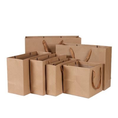 China Flat Handle Plain Brown Gift Bags Customized Logo Biodegradable Durable for sale
