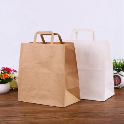 China Custom Printed Kraft Paper Bags Environmentally Friendly Flat Hand Rope for sale