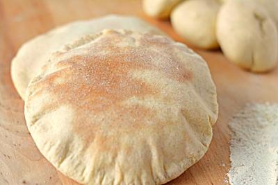 China Arabisch Pitabroodje en Libanees Brood die Machine maken met van Vochtigheid en Verwarmen aanbieden die door PLC wordt gecontroleerd Te koop