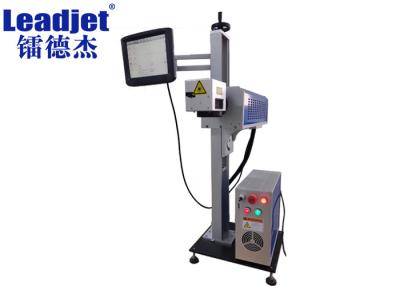 China laser del CO2 1000W que cifra la máquina, impresora del código de fecha del paquete de la hoja en venta
