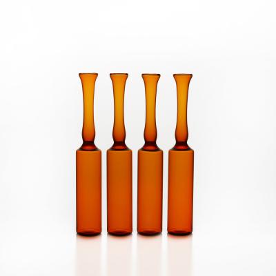 China Transparent Amber 40ml Glass Ampoules Injection Penicillin Bottle for sale