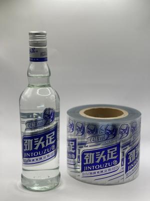 China Etiqueta de botella de vino transparente e imprimible Etiqueta comercial personalizada en venta