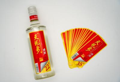 China Etiqueta de botella de cerveza transparente Etiqueta personalizada Impresión Ebay Impresión Etiqueta de envío en venta