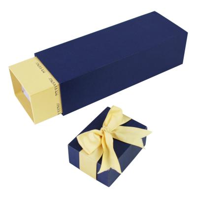 China Straight Stand Up Perfume Packaging Box With Ribbon Compressed Cardboard for sale