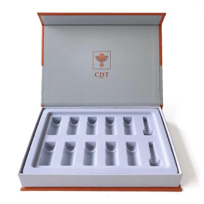 China Orange Elegant Beauty Box Gift Set Custom Glass Bottle Holder Inserts for sale