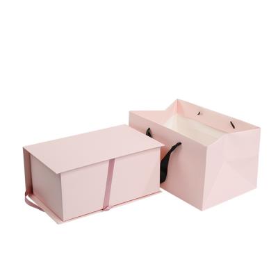 China Flowers Pink Foldable Gift Packaging Box With Ribbon Paper Bags for sale