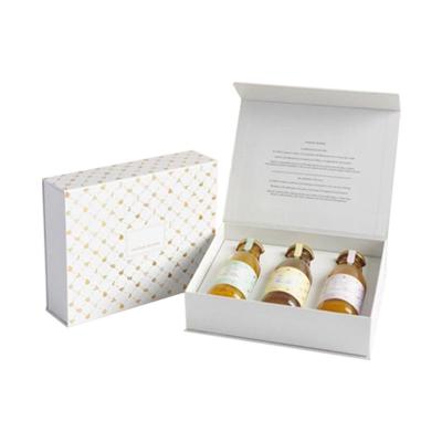 China Caja de regalo blanca Impresión a color personalizada rígida para aceite esencial en venta