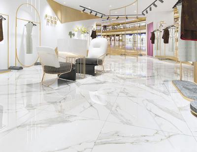 China 48kgs/ctn Calacatta Clay Marble Porcelain Floor Tiles Gold Lines White 10mm for sale