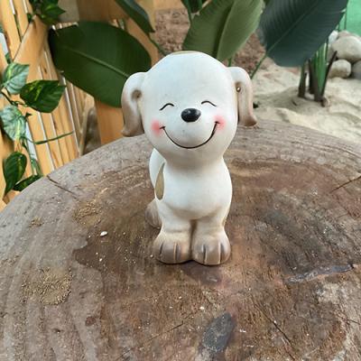 China Custom Pottery Garden Ornaments Handmade Puppy Ceramic Garden Decor en venta