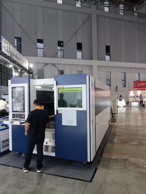 China 3015-12000W Máquina de corte por láser de fibra de dos mesas en venta