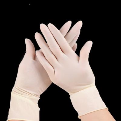 China Touch Screen Design laboratory latex gloves EN455  white disposable gloves for sale