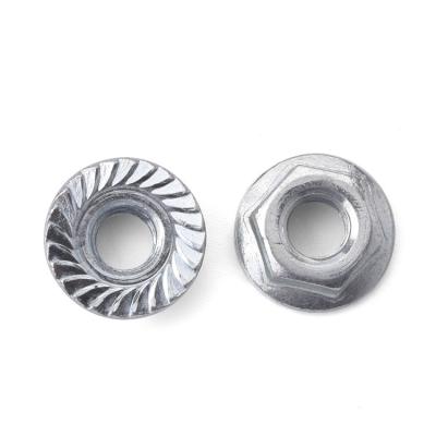 China Din6923 Hexagon Flange Nut With Flange Washer Press Riveted Zinc Silver for sale