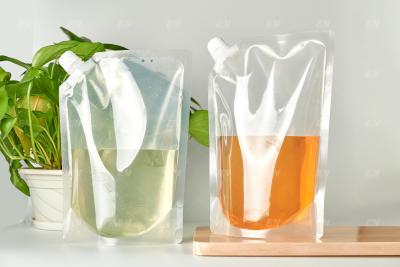 China Trinkbarer Nahrungsmittel-Beutel Eco freundlicher transparenter Stand-250ml oben mit Tülle Plastik-Juice Drink Pouch zu verkaufen