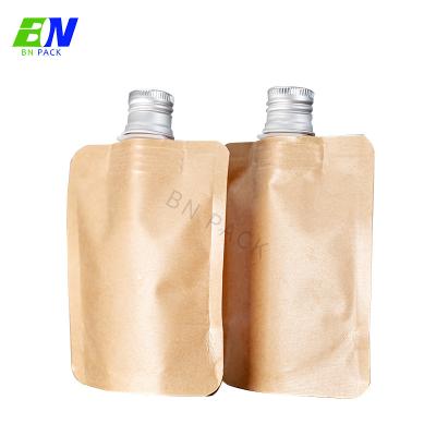 China Waterproof Kraft Paper Stand Up Pouch With Spout Packaging Spout Pouch For Liquid Packaging à venda