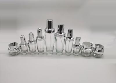 China botella de vidrio del espray de la emulsión de 20g 50g con la bomba de presión de plata en venta
