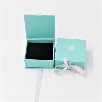 China Blue Crepack Cardboard Jewelry Gift Boxes EVA Ring Paper Earrping Pendant Box With Ribbon for sale