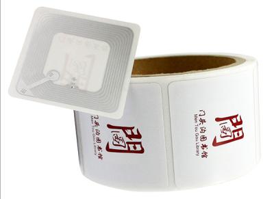 China HF 13.56 Mhz High Performance ISO 15693 RFID Sticker Tags  Readable Writable For Books Library Label Tag for sale