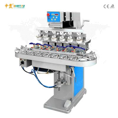China 25pcs/min 18 Station 6 Color Pad Printing Machine With Conveyor for sale