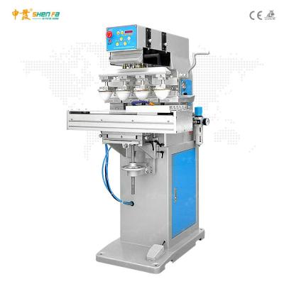 China Shuttle Style Silicon Four Color Pad Printing Machine for sale