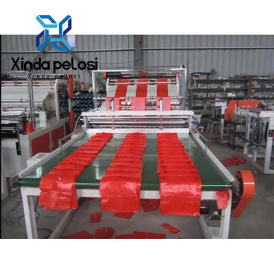 China Automatic Carry Bag Making Machine 220V Plastic Bag Cutting Machine With Auto Belt Conveyor for sale