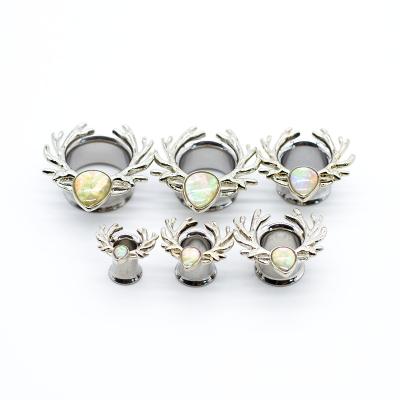 China Ear Plug Tunnels In Stainless Steel Ear Plug Tunnel  With White Shell Paper for sale