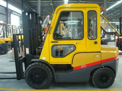 China Free Lifting 3T Diesel Forklift With Cab Two Stage Three Stage Mast Yellow for sale