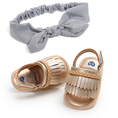 China In stock PU Leather Tassel Soft sole baby barefoot sandals with hair band for sale