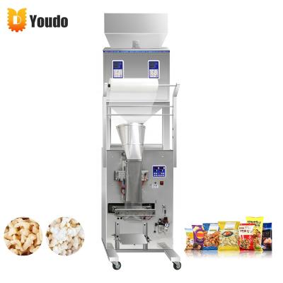 China Automatic multi small food puffed food other corn snacks packing machinesnacks packing machine for low nitrogen filling price for sale
