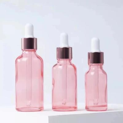 China Pink Glass Essential Oil Dropper Bottle 50ml 100ml Empty 5000pcs for sale
