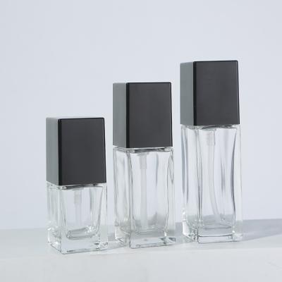 China 50ml Refillable Plastic Pump Bottle Transparent Square Liquid Foundation Essence for sale