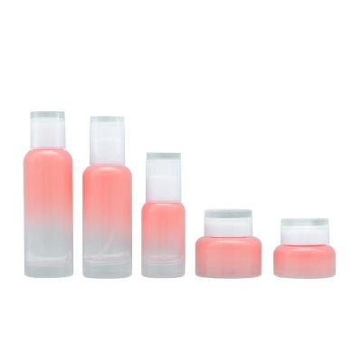 China 100ml 120ml Luxury Cosmetics Packaging Pink Glass Acrylic Lotion Essence Face Cream Jar for sale