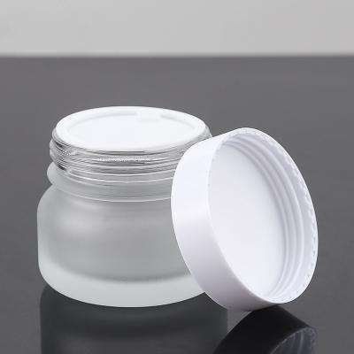 China Customizable Cream Jar Containers 50g Empty Bottles Frosted Glass Jar Te koop
